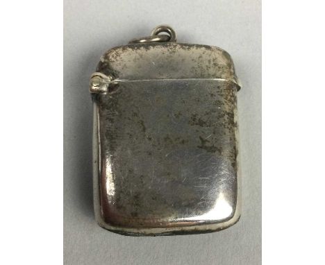 TWO SILVER VESTA CASES,along with a silvered photograph frame, silver miniature pot, also a seal, caddy spoon and another spo