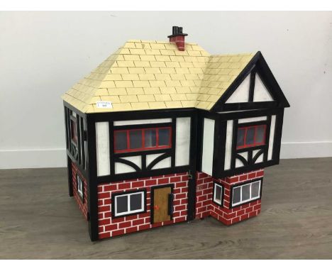 VINTAGE DOLLS HOUSE,along with a child's push along toy containing building blocks and a toy high chair
