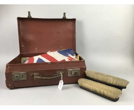 LOT OF VARIOUS FLAGS,contained in a vintage suitcase, along with various shoe brushes and a lady's handbagCondition report: P