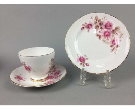 ROYAL SUTHERLAND FLORAL AND GILT TEA SERVICE,comprising six trios, along with a Queen Tea service, comprising six trios, suga