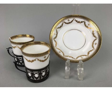 PARAGON SILVER MOUNTED PART COFFEE SERVICE,the gilt Greek key pattern liners in silver mounts, comprising six cups and four s