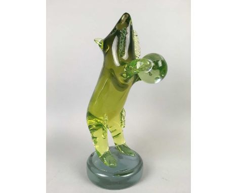 GLASS MODEL OF A BEAR,probably Murano, modelled standing on its hind legs, in green with amethyst tinted circular base, 33cm 