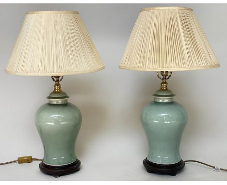 TABLE LAMPS, a pair Chinese celadon ceramic ginger jar form, with silk pleated shades, 68cm H. (2) 