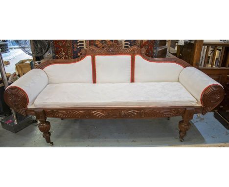 SOFA, 104cm H x 225cm W, Anglo-Indian hardwood with squab seat cushion in white damask on castors. 
