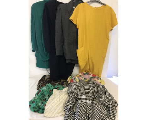 9 items of vintage ladies clothing by designer Ungaro. Comprising a strawberry print blouse, a matching floral top and skirt,