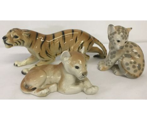 3 Lomonosov and West German ceramic 'big cats'. Comprising Lomonosov Leopard cub, Lomonosov Lion cub, and West German Tiger. 