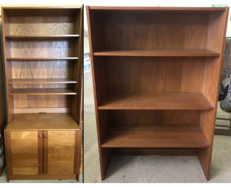 A vintage teak shelving unit with 2 door cupboard base together with a 3 shelf dresser top. Danish made by Domino Mobler, wit