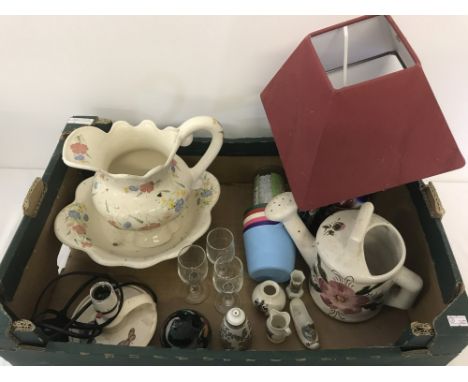 A box of assorted misc items, mostly ceramic. To include Oldham Pottery "Wee Willie Winkie" lamp base, large ceramic jug and 