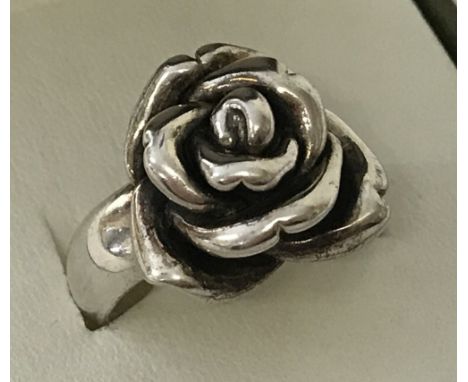 A 925 silver rose head dress ring. Size P. Total weight 5g.