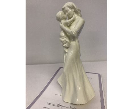 A Royal Worcester figurine from the Tender Moments range, "First Kiss". No. 4011 of 7,500 with COA. Approx. 20.5cm tall.