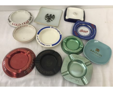 A quantity of assorted vintage advertising ash trays. To include ceramic, glass, metal and Bakelite. 