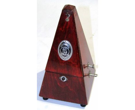 Late 20th century German metronome of typical pyramid form, height 24cm