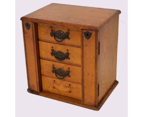 Victorian light oak table top apprentices chest in the form of a Wellington chest with two locking side flaps enclosing four 