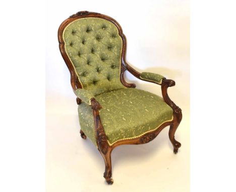 Victorian walnut gent's chair upholstered in patterned green button back