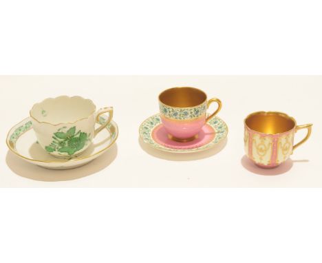 Royal Worcester cup and saucer together with a Herend cup and saucer and Royal Doulton cup, the saucer 12cm diam (5) 