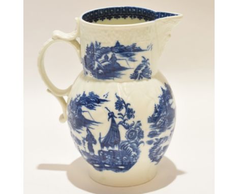 Late 18th century Caughley porcelain mask jug decorated with Fishermen pattern, 18cm high 