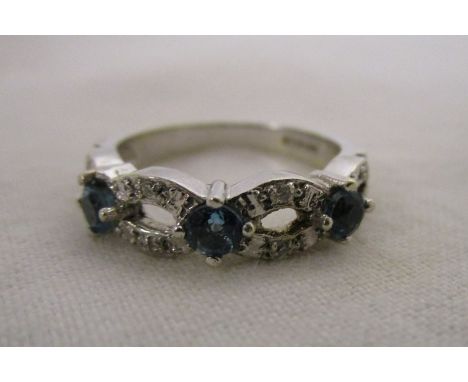 White gold blue topaz &amp; diamond set ring