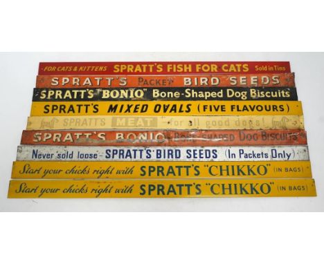 Nine mid century Spratt’s tinplate advertising shelf strips, length 52cm. Condition - poor-fair