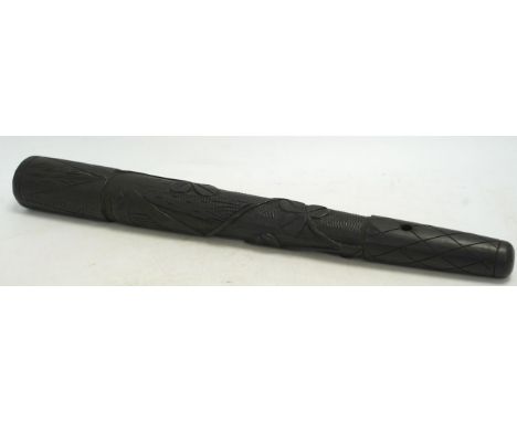 A late 19th/early 20th century Irish bog oak truncheon, carved with a harp and clovers, 37cm in length. Condition - good