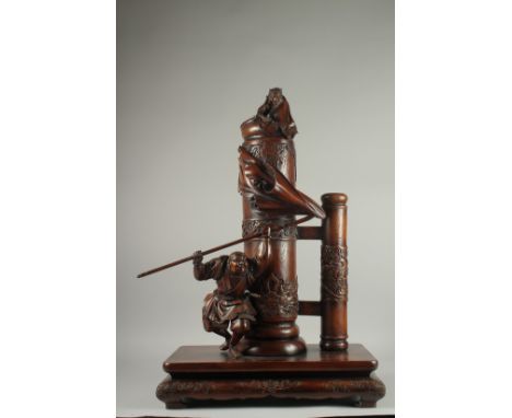 A VERY LARGE JAPANESE CARVED WOOD FIGURAL OKIMONO GROUP - depicting Watanabe No Tsuna fighting the Ibaraki Demon at the Rasho