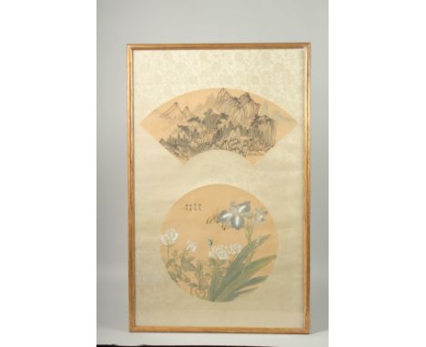 TWO FRAMED CHINESE PAINTINGS ON SILK, one fan painting depicting a mountainous landscape, the other circular panel with butte