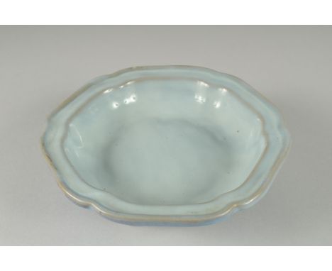 A CHINESE LIGHT BLUE MONOCHROME GLAZED FOOTED DISH, 19.5cm wide.