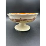A Royal Doulton "Rustic England" stemmed fruit bowl