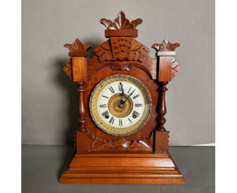 An Ansonia of New York eight day mantel clock with gilt and enamel face 