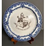 A large Royal Doulton coat of arms plate in blue and white (some chips to rim)