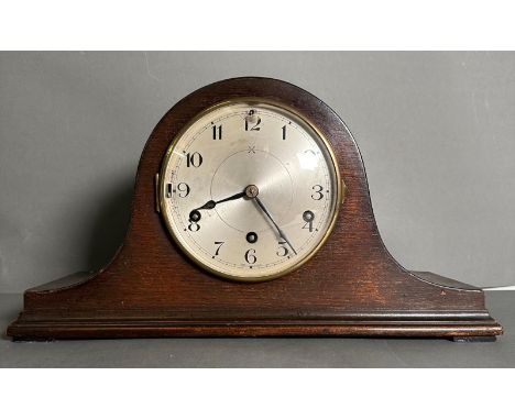 An oak cased Napoleons hat mantel clock 