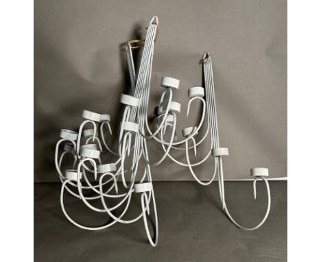 Four wrought iron white wall hanging tea light holders 