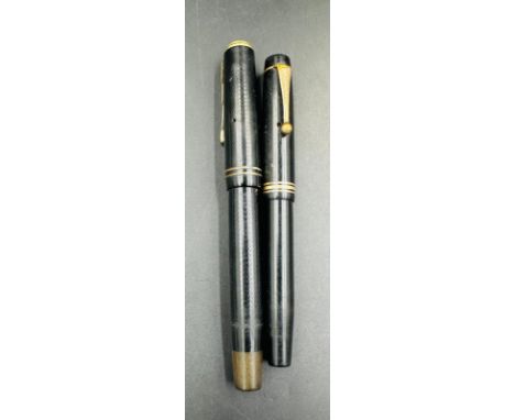 Two vintage fountain pens, one Parker.