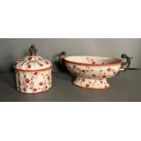 An Art Nouveau style floraly painted lidded pot and a matching two handled dish