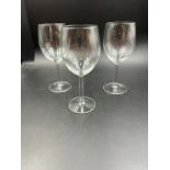 Twenty four wine glasses