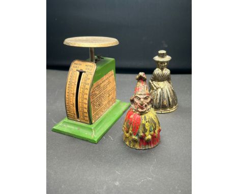 Vintage letter scales and hand bell in the form of Punch and a lady 