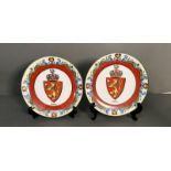 Two china plates with the Norweigan national lion and floral design.