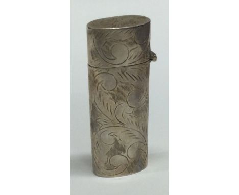 A silver engraved lighter. Marked to base. Approx. 26 grams. Est. £30 - £50.