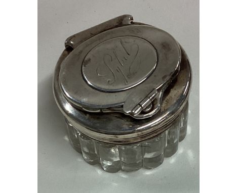 A Victorian silver and glass inkwell with screw-top lid. Est. £80 - £120.