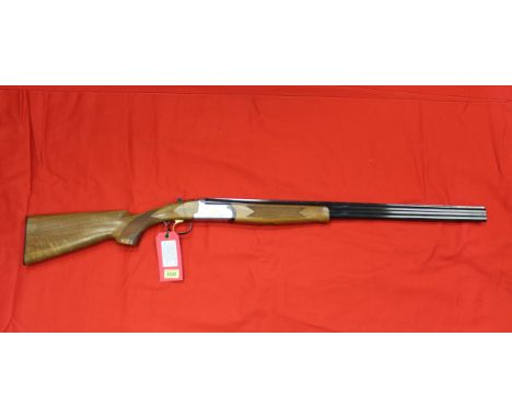 A 20 bore O/U shotgun by Lincoln, this fine example is the premier model with 28" barrels, single trigger and selective safet