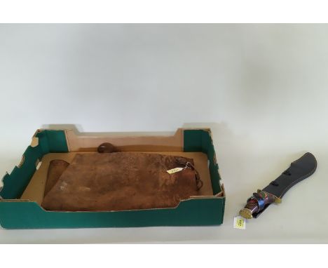 A large modern Bowie/hunting knife within leather sheath together with a vintage leather apron