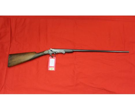 A Belgian .410 single barrel, hammer side lever folding shotgun, S/No.31, this item can only be purchased by someone with a c