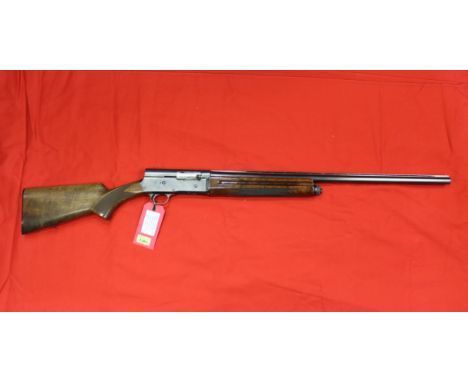 A 12 bore Browning self loading shotgun, S/No.14808, in overall very good condition, this item can only be purchased by someo