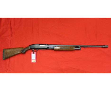 A 12 bore pump-action shotgun by Mossberg, S/No.H492829, in overall good condition, this item can only be purchased by someon