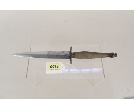 A Wilkinson sword Mk II Fairbairn Sykes fighting knife, one large 'Wilkinson Sword London etched panel', thought to be just p