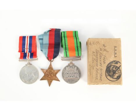 A boxed WWII group of three with slip including 39/45 Star (Army issue)