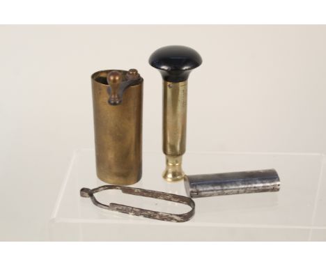 A mixed lot including a clip cartridge extractor, a Sykes patent 1 1/4 oz double shot charger plus a hand reloading tool mark