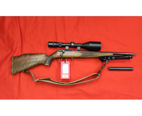 A .22 R/F bolt action by Anschutz (model GMBH ULM/D) S/No.1133792, the rifle is in 'as new' condition complete with Nikko Sti