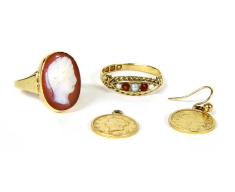 A Victorian 18ct gold garnet and split pearl boat ring, with a row of graduated split pearls and round cut garnets, grain set