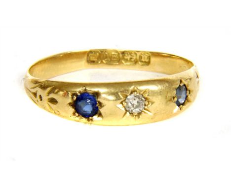 A Victorian 18ct gold diamond, sapphire and doublet ring, with a Swiss cut diamond with a single cut sapphire at one side and