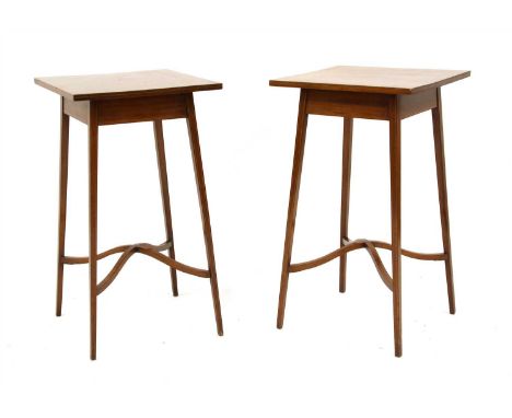 A pair of early 20th century inlaid mahogany lamp tables, the square tops with ebony and boxwood border and the square taperi